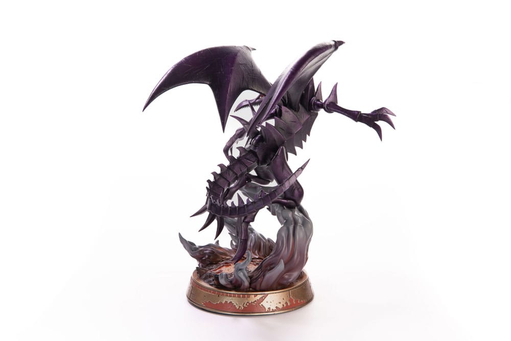 Side view of detailed collectible statue of a metallic violet winged dragon with an open mouth, standing on a fiery base