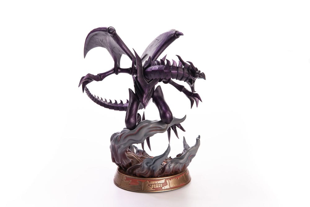 Side view of detailed collectible statue of a metallic violet winged dragon with an open mouth, standing on a fiery base