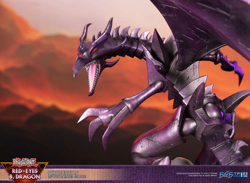 Purple metallic Red-Eyes B. Dragon PVC statue (Yu-Gi-Oh!) roaring with open mouth and sharp teeth against a fiery orange background