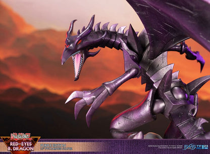 Purple metallic Red-Eyes B. Dragon PVC statue (Yu-Gi-Oh!) roaring with open mouth and sharp teeth against a fiery orange background