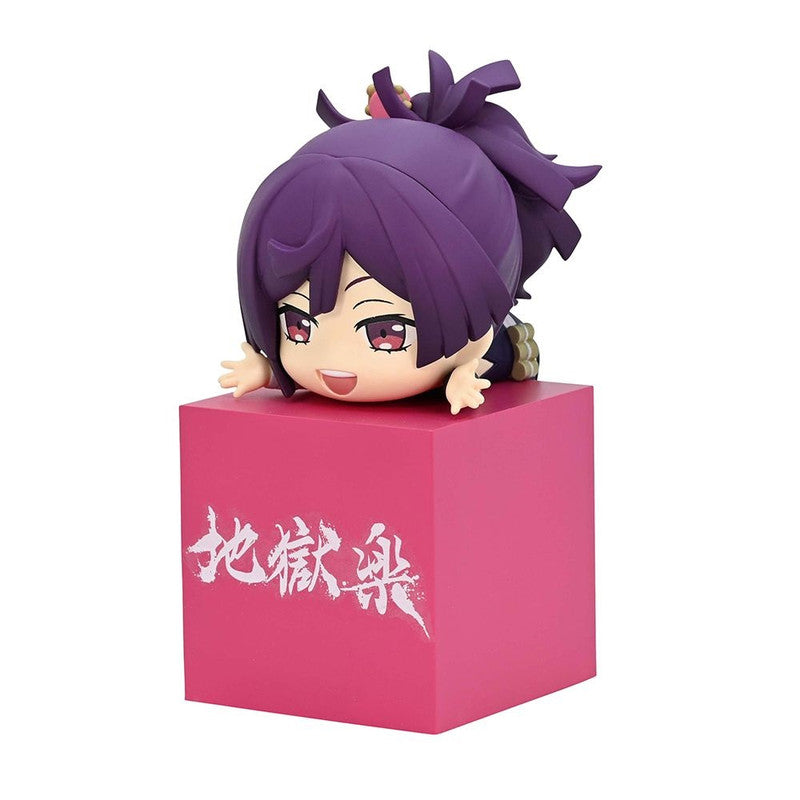 Chibi anime figure of a character with purple hair on a pink box with Japanese writing