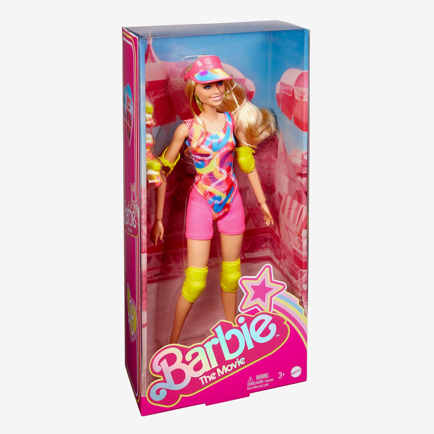 Barbie 'The Movie' doll in box, wearing a neon rollerblade outfit with pink visor and yellow pads
